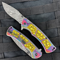 Dark Side Damascus Etched Grey / Gold Multi Color Skulls Spring Assisted Fantasy Pocket Knife 3.5"
