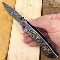 Dark Side Damascus Etched Grey / Silver Multi Color Skulls Spring Assisted Fantasy Pocket Knife 3.5"
